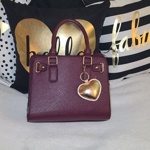 Small burgundy and gold purse